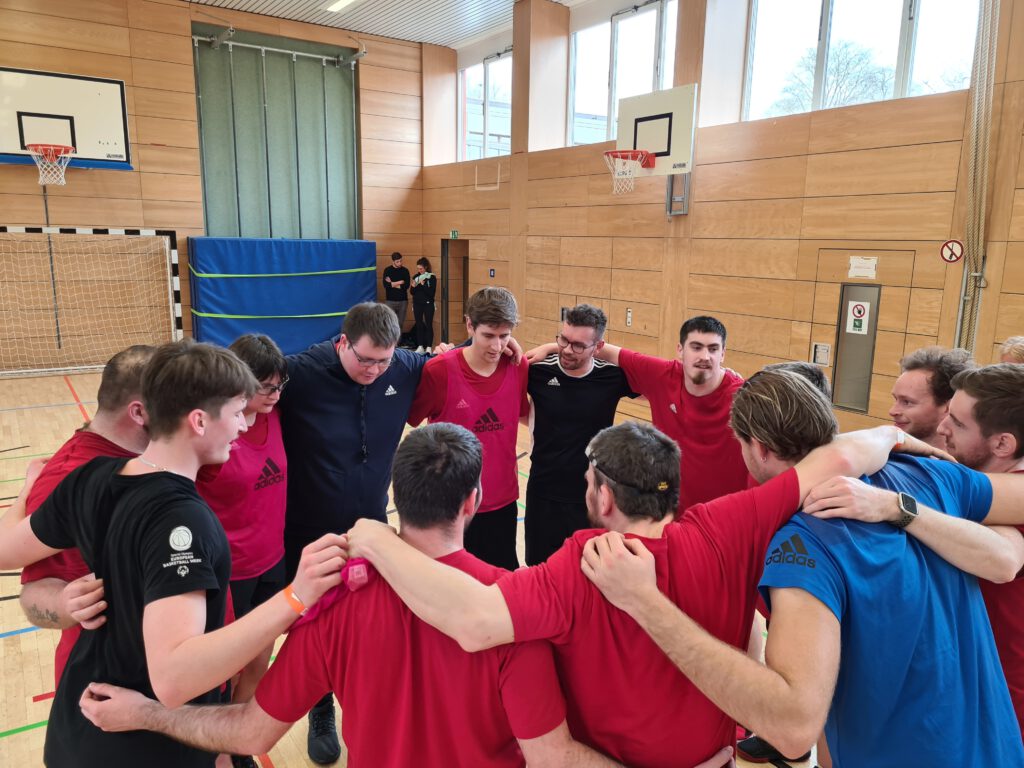Mannschaft in Sporthalle
